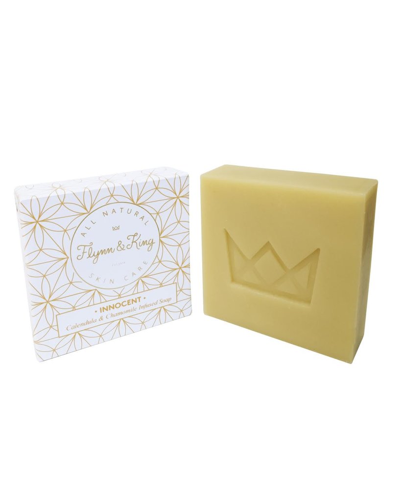 Flynn & King Innocent Calendula and Chamomile Infused Soap, 5 oz bar next to packaging