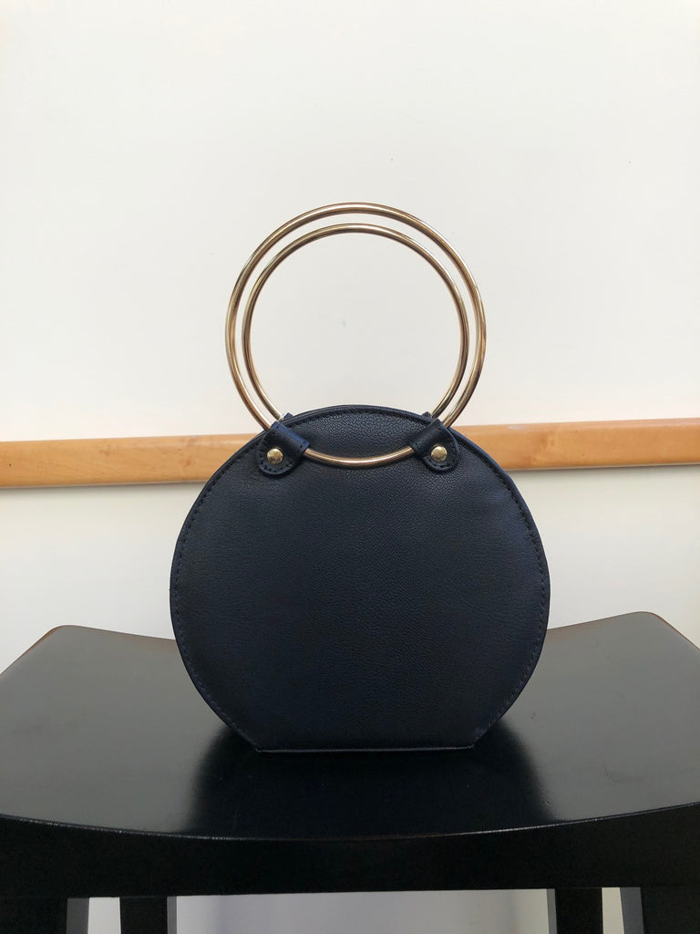 Ceibo Handcrafted Ring Bag in Black, front view