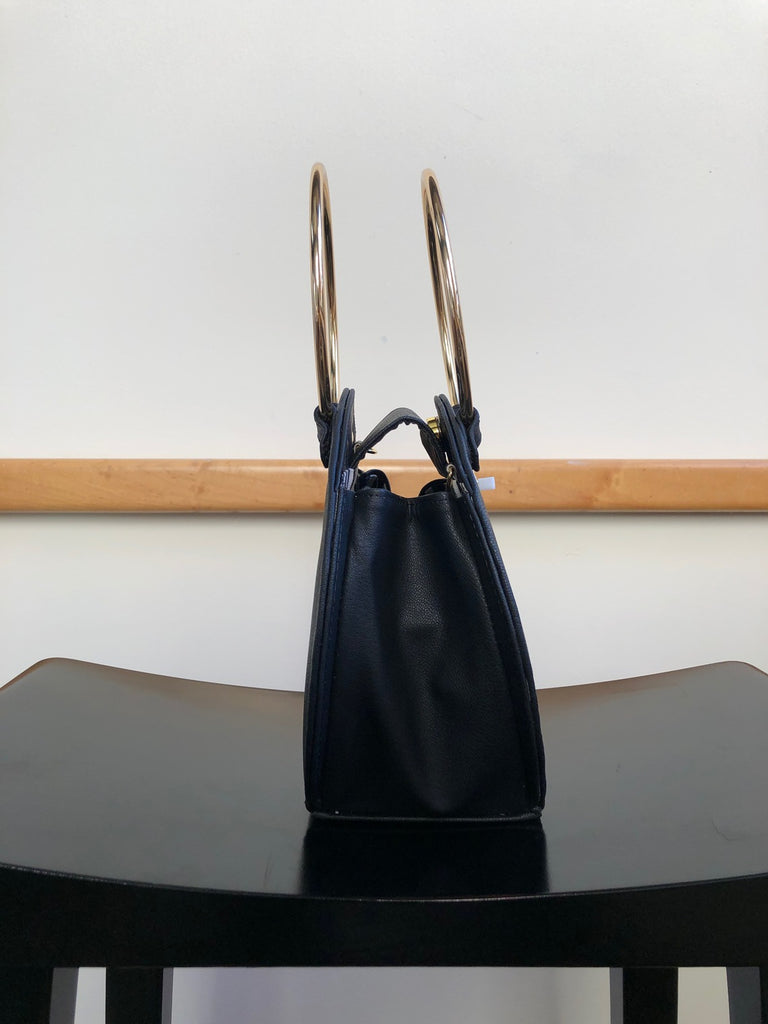 Ceibo Handcrafted Ring Bag in Black, side view