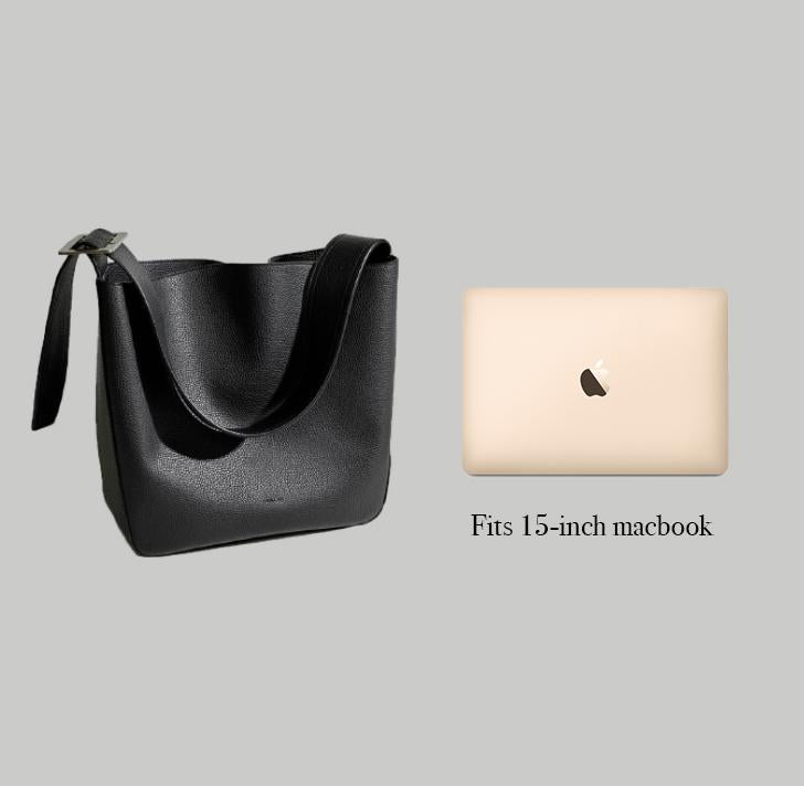 Angela Roi Vegan Jane Shoulder in Black, side-by-side with Macbook