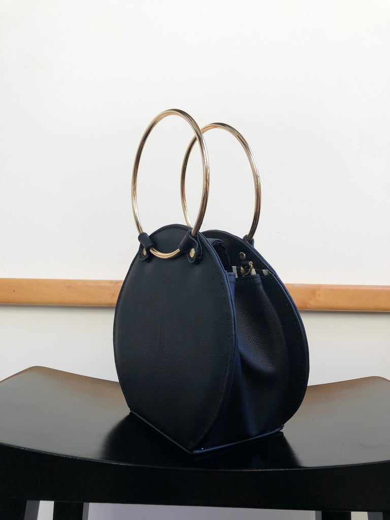 Ceibo Handcrafted Ring Bag in Black, 3/4 view